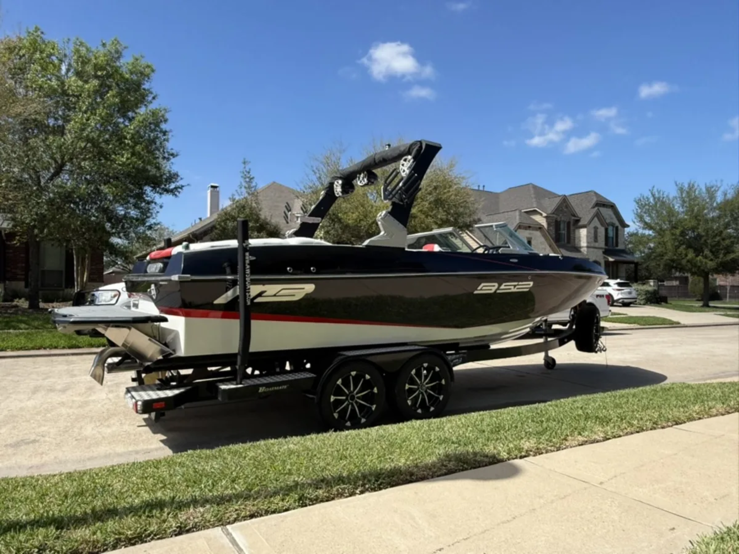236 hours. Indmar Raptor 400hp. Covered its whole life. This boat is clean. Like stupid clean.